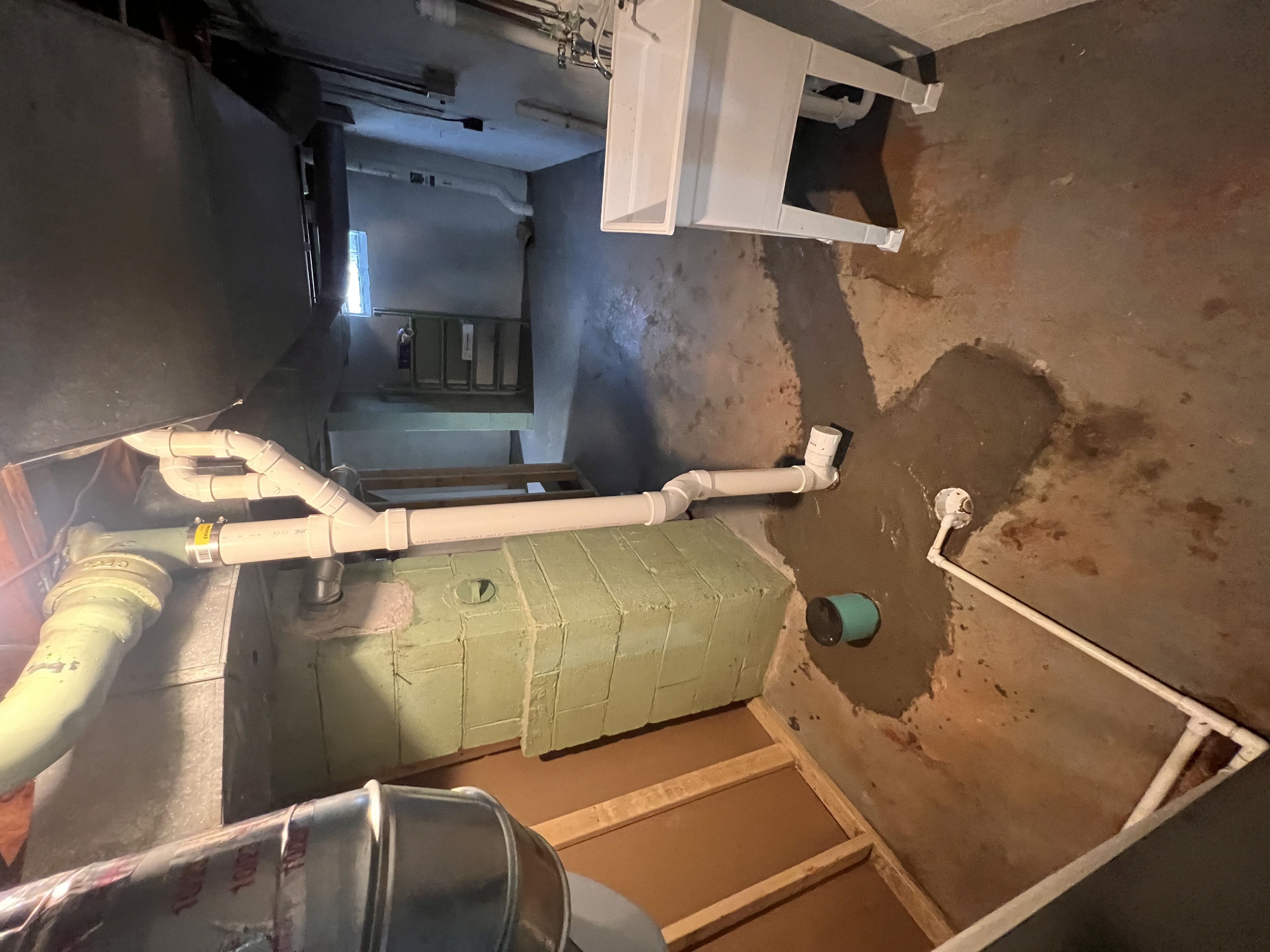 Basement drain stack plumbing by Ward and Sons Plumbing